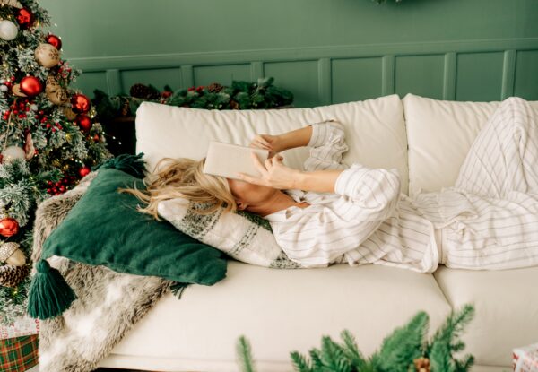 Stressed,Woman,Is,Resting,On,The,Sofa,During,The,Christmas